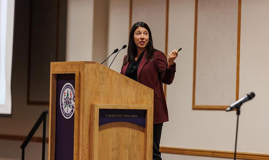 Jillian Peterson speaking at Symposium Against Indifference